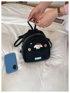 Petit sac à dos noir en cuir PU avec patch de chien mignon et boutons en bois.