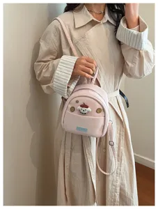 Charmant mini sac à dos rose détail avec patch animal mignon et design décontracté quotidien.
