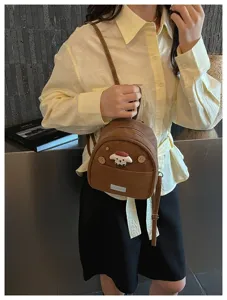 Mignon mini sac à dos marron avec détail de chiot, parfait pour le quotidien et style chic.