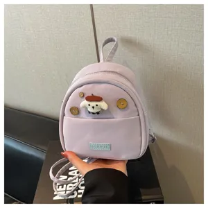 Petit sac à dos violet pour femme, écusson chien mignon, mini sac casual pour tous les jours.