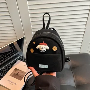Mini sac à dos noir en toile pour femme, joli patch de chien et boutons en bois.