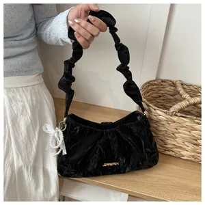 Black velvet pleated shoulder bag detail, elegant underarm cloud bag with pearl lace charm.