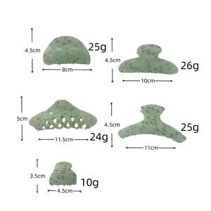 Groene geruite haarspelden set in verschillende maten en gewichten voor dagelijks gebruik.