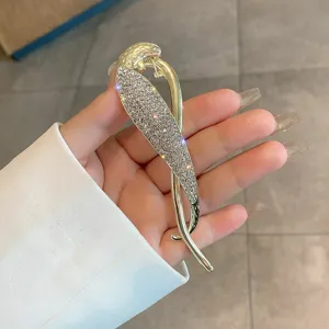Pince à cheveux élégante en alliage dorée avec strass scintillants pour coiffure femme