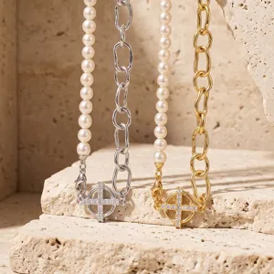 Elegant pearl and chunky chain necklace with cross pendant, fashion jewelry accessory for women.