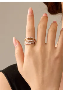Exquisite multi-layer pave diamond ring detail shot showcasing sparkling zircon stones.