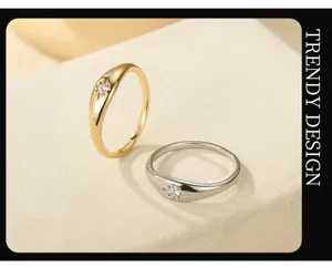 Close-up detail shot of vintage eight-pointed star rings in gold and silver with sparkle stone.