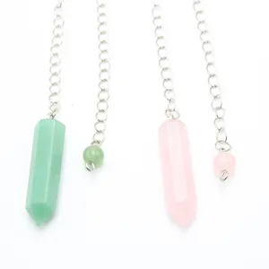 Crystal gemstone hexagonal pillar pendulum pendant details showing faceted design and metal chains.