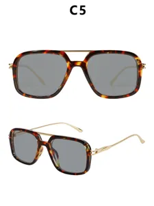 Detailed view of retro square double-bridge sunglasses, tortoise shell frame with grey lenses.