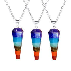 Detailed view of the multi-color crystal hexagonal pendulum pendant necklace with silver chain.