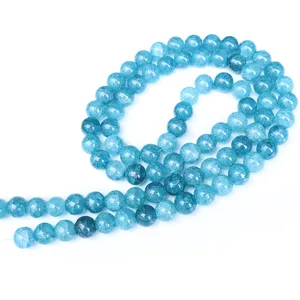 Blue cracked agate glass beads detail shot, smooth polished round loose beads for jewelry making