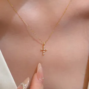 Dainty S925 silver cross pendant necklace with sparkling cubic zirconia stones for women daily style.