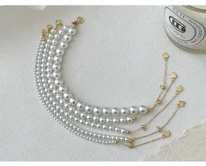 Élégant bracelet de perles en argent S925 pour femmes, superposition de chaînes délicates.