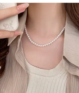 Elegant white pearl choker necklace for women, classic short beaded collar jewelry gift.