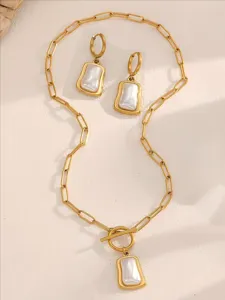 Ensemble de bijoux collier et boucles d'oreilles coquillage blanc acier titane or exquis