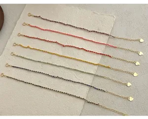 S925 silver woven rope bracelet detail view, colorful curb chain with cute heart charm design.