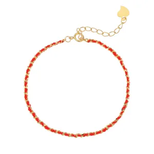 Elegant red cord woven chain bracelet for women with gold-tone extension and cute heart charm.
