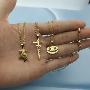 Χρυσά κολιέ μενταγιόν Halloween από ανοξείδωτο ατσάλι με χάρο, σταυρό και κολοκύθα.