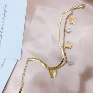 Goldene doppellagige Schmetterlings-Kettenarmband mit Strass, eleganter edler Edelstahlschmuck.