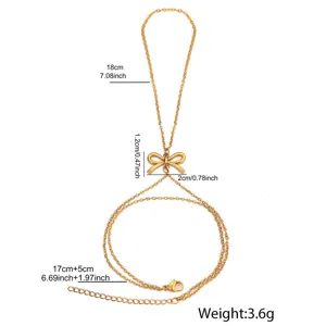 Goldene Edelstahl Schleife Handkette Detailansicht, elegante Schmuckspezifikation.