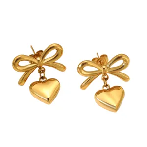 Boucles d'oreilles nœud cœur dorées mode élégantes femmes bijoux métal image principale
