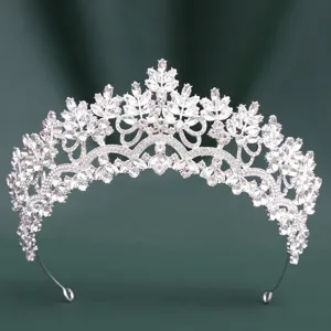 Detailed close-up shot of a sparkling silver crystal bridal tiara with elegant marquise rhinestones.