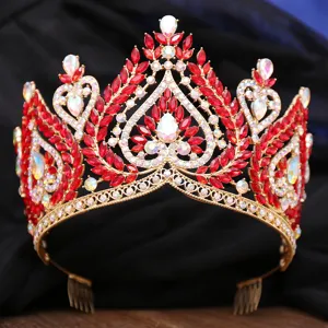 Luxurious Baroque red crystal bridal crown detailed shot, elegant gold tiara for wedding.