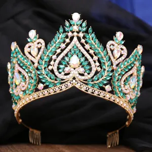 Luxurious baroque gold crown detail, sparkling green crystal tiara for bridal wedding accessories.