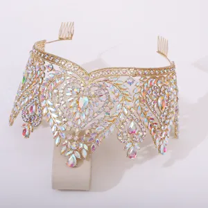 Close-up of luxury gold crystal bridal tiara showcasing intricate baroque details.