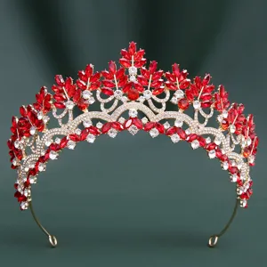 Close-up detail of the stunning bridal red crystal crown, featuring exquisite marquise rhinestones.