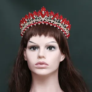 Stunning red crystal bridal crown with golden metal base, perfect wedding hair accessory.
