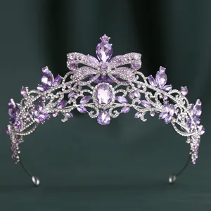 Close-up detail shot of a stunning purple rhinestone butterfly tiara, vintage bridal crown design.