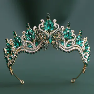 Exquisite close-up detail of the baroque emerald green crystal tiara crown with rhinestones.