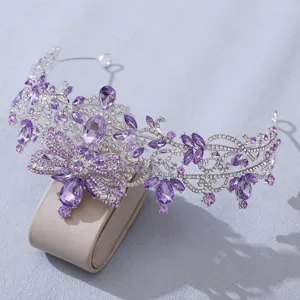 Detail view of Baroque rhinestone butterfly crown bridal tiara featuring purple crystal elements.
