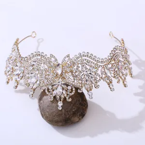 Detailed view of the gold alloy crystal rhinestone crown with exquisite butterfly design.