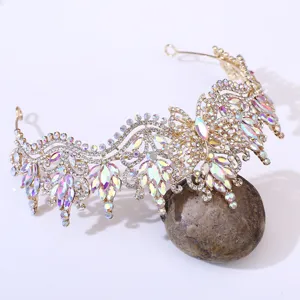 Detailed closeup of exquisite baroque bridal crystal tiara with butterfly and AB rhinestones.