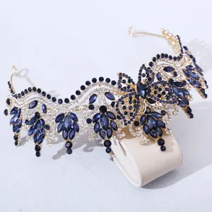 Exquisite alloy crystal bridal tiara featuring blue rhinestones and butterfly design details.