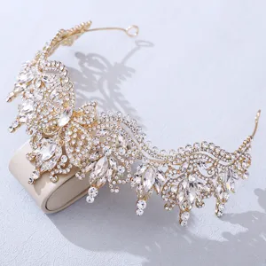Gold crystal butterfly tiara detail view, sparkling rhinestone bridal crown hair accessory closeup