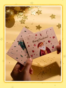 Tarjeta de felicitación de Navidad plegada de papel DIY hecha a mano con diseño de Papá Noel.