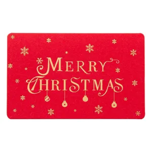 Tarjeta de felicitación navideña roja con texto dorado y diseño de copos festivos.