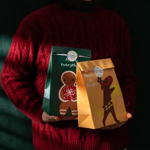 Bolsas de regalo de Navidad con estampado de jengibre y reno, perfectas para envolver.