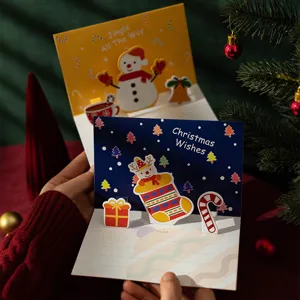 Tarjeta de felicitación navideña 3D creativa con lindos diseños de dibujos animados.