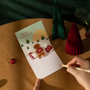 Tarjeta de felicitacion de Navidad pop-up 3D creativa con diseño de pan de gengibre