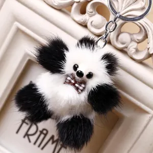 Lindo dije de bolso de piel de panda en blanco y negro y llavero de coche de material de peluche suave.