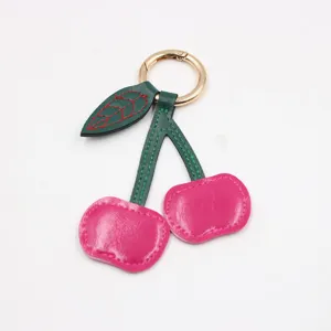 Leren kersen sleutelhanger leuke tas charm metalen ring roze fruit auto accessoire