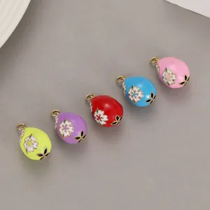 Colorful enamel Easter egg pendants set, detailed floral charms for DIY jewelry making necklaces.