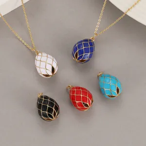 Colorful enamel Easter egg pendant necklaces with gold grid chains, retro vintage style jewelry.