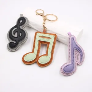 Portachiavi in Pelle con Simbolo Musicale Ciondolo per Borsa con Nota Musicale Trama Litchi Anello per Chiavi Auto Regalo Creativo