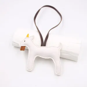 White leather goat bag charm pendant with brown strap luxury style handbag purse accessory decor