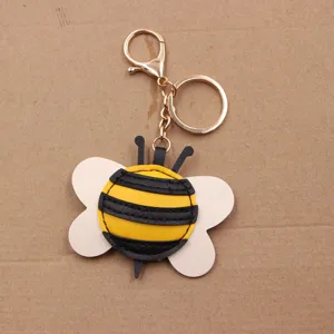 Süßer Bienen Leder Schlüsselanhänger mehrschichtige Tasche Anhänger goldener Metallring